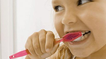 kid brushes teeth